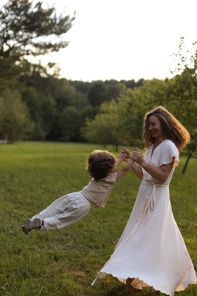 a woman with a baby in her hand